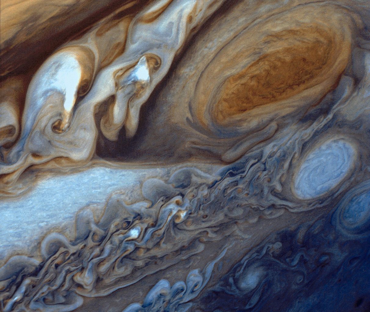 An image of the planet Jupiter showing the Great Red Spot. 
