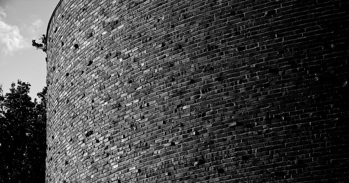 A black and white photo of bricks making up Kresge Auditorium at MIT. 