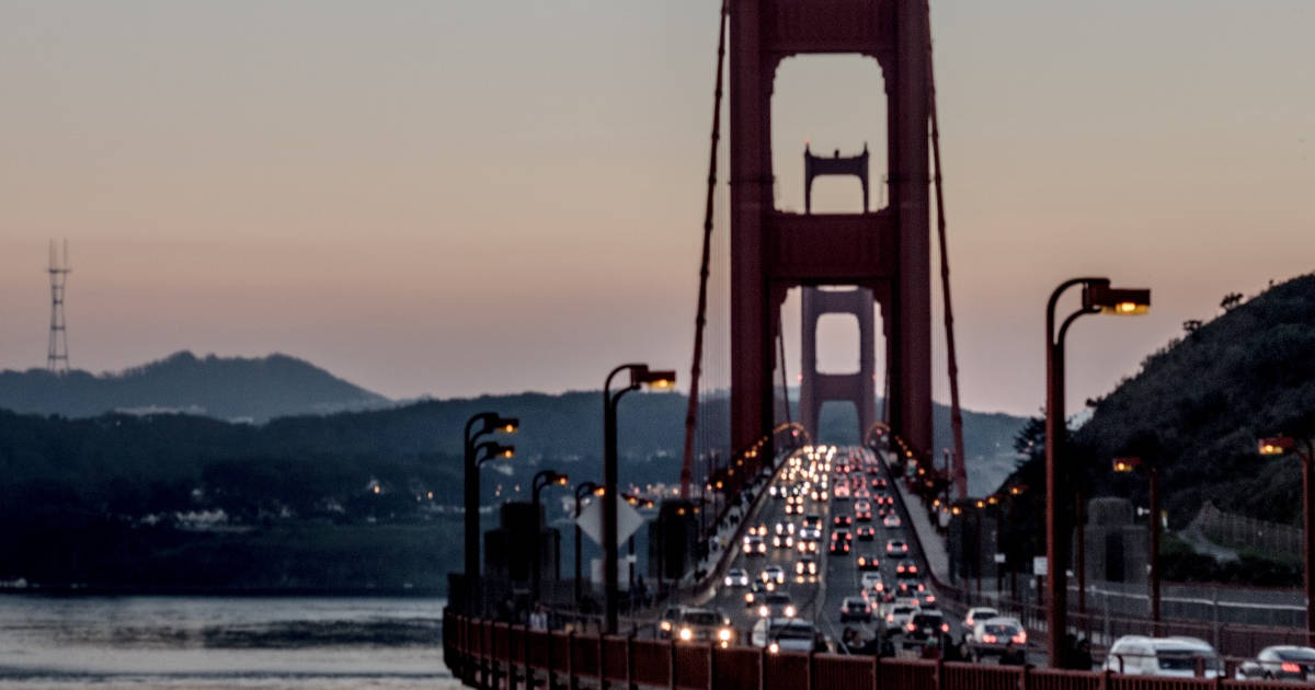 Cars crossing the Golden Gate Bridge as seen from Marin. 